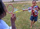 TWK 7851 BubbleBoy&#38;Grandma copy  Louise Gossett, left, blows soap bubbles as her grandson Joseph Broadus, 4, right, tries to break them before they get past him, as the two share some fun in the summer heat, at Gossett&#39;s home in Spartanburg, SC, Wednesday evening, 6-6-07.